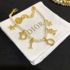 Dior Dioevolution Yellow Gold Paved Diamonds DIOR Logo Pendants Females White Pearl Bracelet